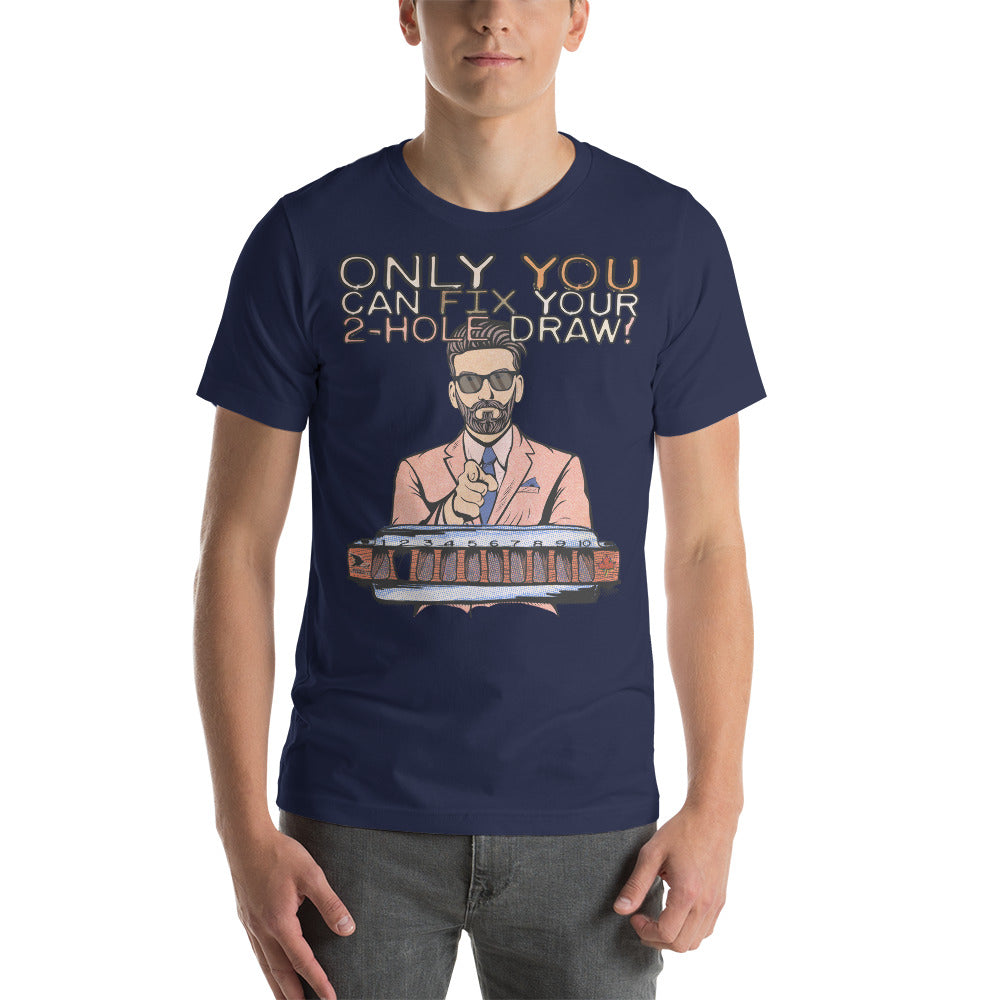 A male model wearing the blue version of the T-Shirt. The shirt reads, "Only YOU can fix your 2-hole draw!" Under this text is a man in sunglasses and a pink suit and tie, pointing forward, above a harmonica with a blank space in the 2-hole.